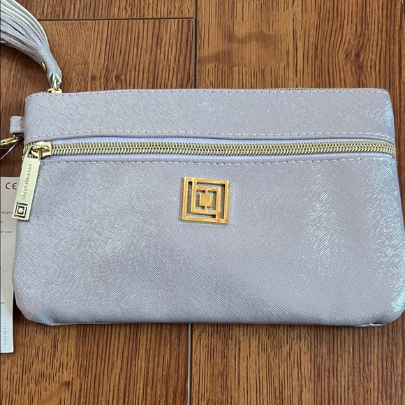 NWT Liz Claiborne Metallic Silver Phone Charging Wristlet with Tassel - Picture 4 of 9
